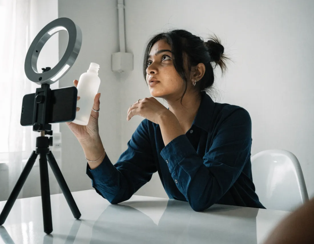 Creator filming a product review